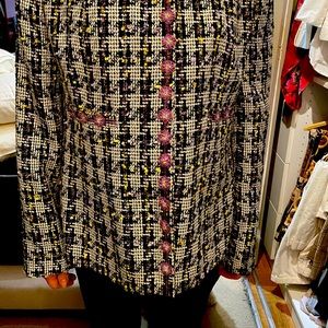 Blazer. Black and white with purple flowers and lots of detail